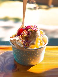 Close-up of ice cream in bowl on table