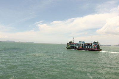 Nautical vessel on sea against sky