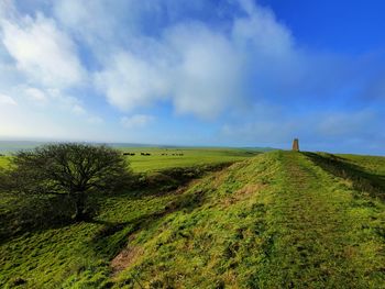 Scenic view of land against sky