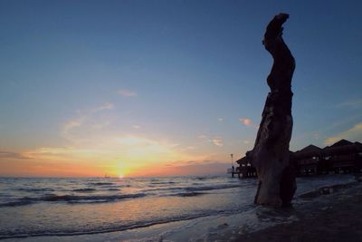 Scenic view of sea at sunset