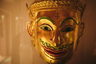 Close-up of golden mask