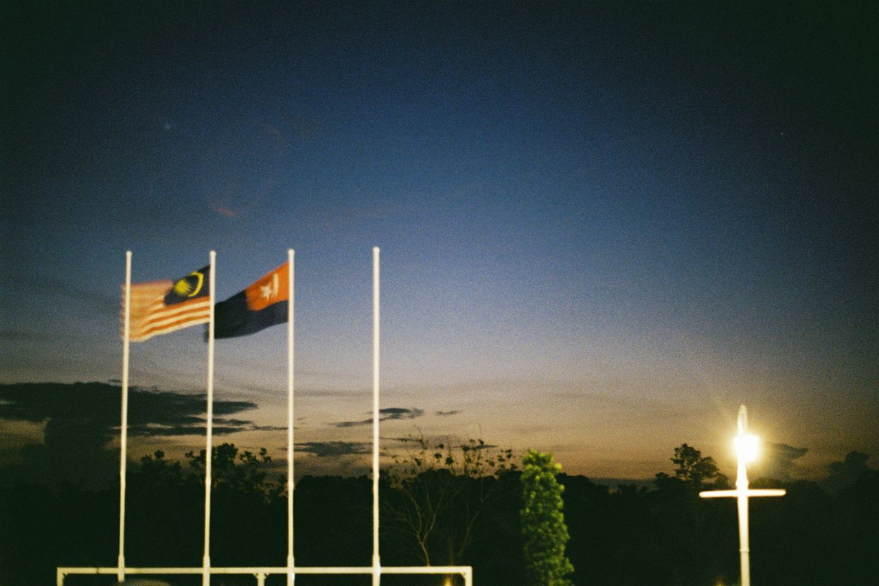 LOW ANGLE VIEW OF STREET LIGHT AGAINST SKY
