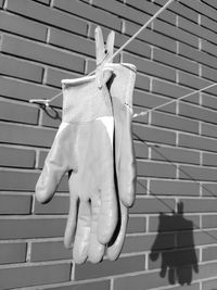 Close-up of clothes hanging on wall