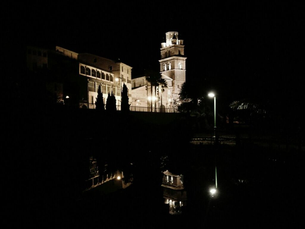 night, building exterior, architecture, built structure, illuminated, religion, place of worship, silhouette, lighting equipment, church, street light, dark, spirituality, sky, famous place, history, city, low angle view, travel destinations