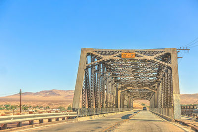 View of bridge against clear blue sky