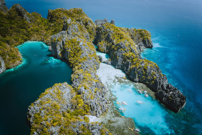 High angle view of rock formation in sea