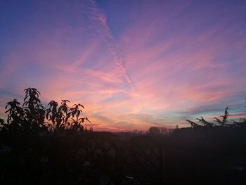 View of cityscape against sky at sunset