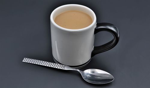 Close-up of coffee cup on table