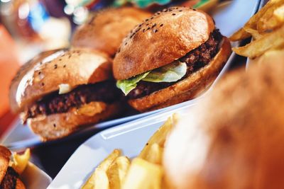 High angle view of burgers served in tray on table