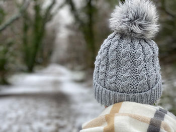 Rear view of woman in snow