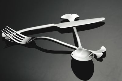 Close-up of spoon and fork on table