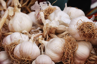 Close-up of garlic bulbs for sale in market