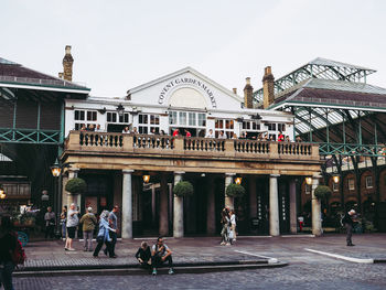 Group of people in front of building