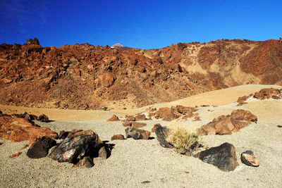 Rocky landscape against blue sky