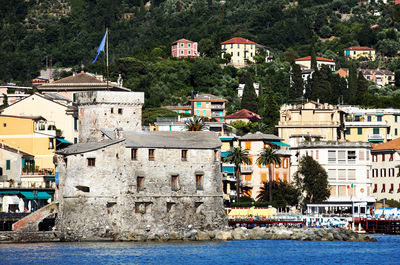 Scenic view of cinque terre by sea