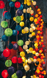 High angle view of multi colored decorations hanging for sale