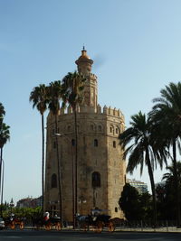 Low angle view of tower against clear blue sky