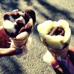 Close-up of hand holding ice cream