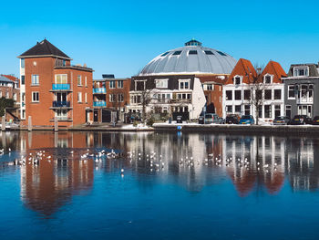 Reflection of buildings in lake