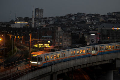 High angle view of illuminated city at night