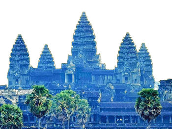 Panoramic view of trees and buildings against clear sky