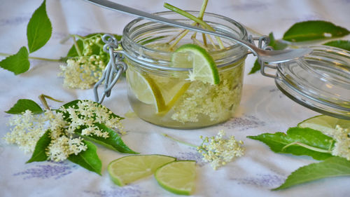 Close-up of fruits in glass jar on table