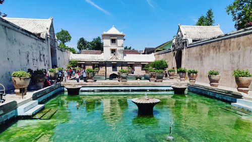 View of swimming pool against building