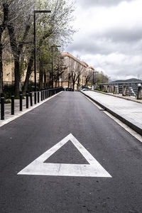 Empty road against sky