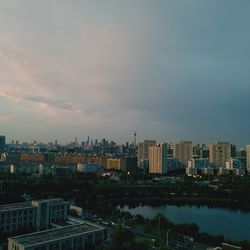 High angle view of buildings against sky during sunset