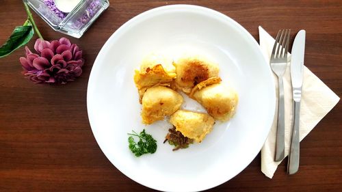 Directly above shot of food in plate on table