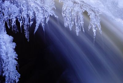 Low angle view of frozen water