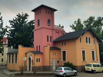 Houses against sky in city