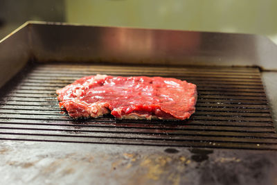 Close-up of meat on barbecue grill