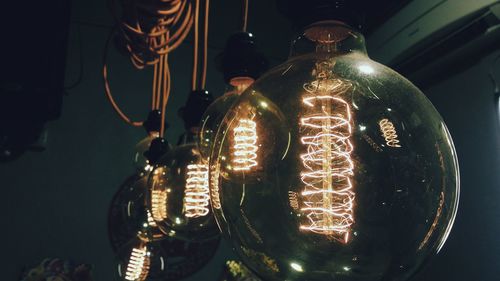 Close-up of illuminated light bulb