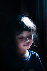 Close-up portrait of boy looking away