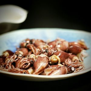 Close-up of baby squid in bowl