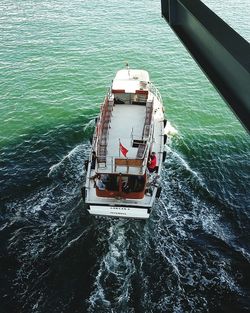 High angle view of boat sailing on sea