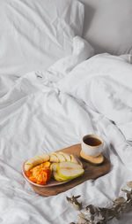 High angle view of fruits on bed at home