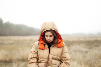 Outdoor portrait of a young woman.