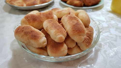 High angle view of baked bread in plate on table