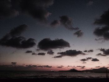 Scenic view of sea against cloudy sky