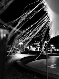 Light trails against sky at night