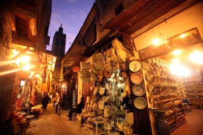 Ceramics for sale at street market during night