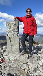 Full length of man standing on rock