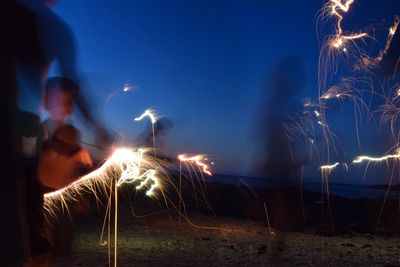 Firework display at night