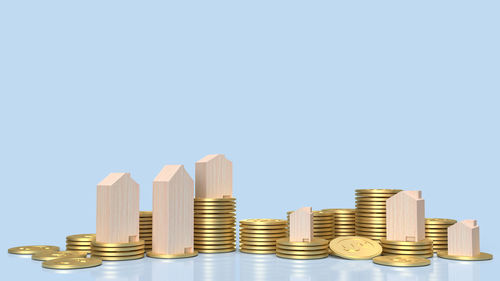 Stack of coin against white background