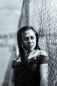 Portrait of young woman looking away