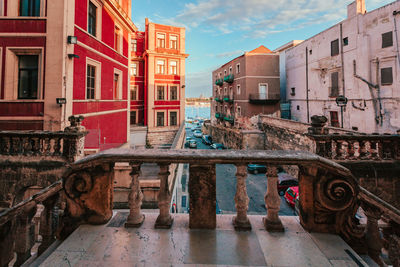 View of the sea between the palaces from the church of san domenico in the old town of taranto