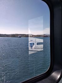 View of sea through airplane window