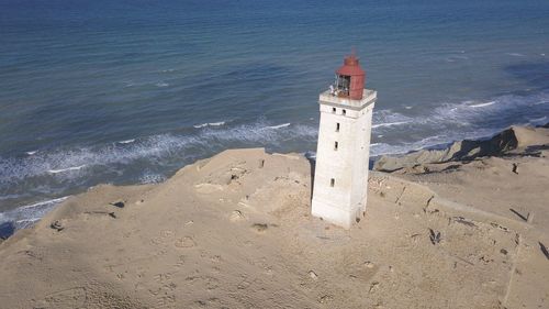 High angle view of lighthouse at beach